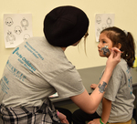 2018 Family Reading Night: Face painting by Jean Bigger