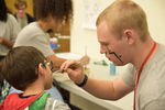 2018 Family Reading Night: Face painting by Information Resource Center
